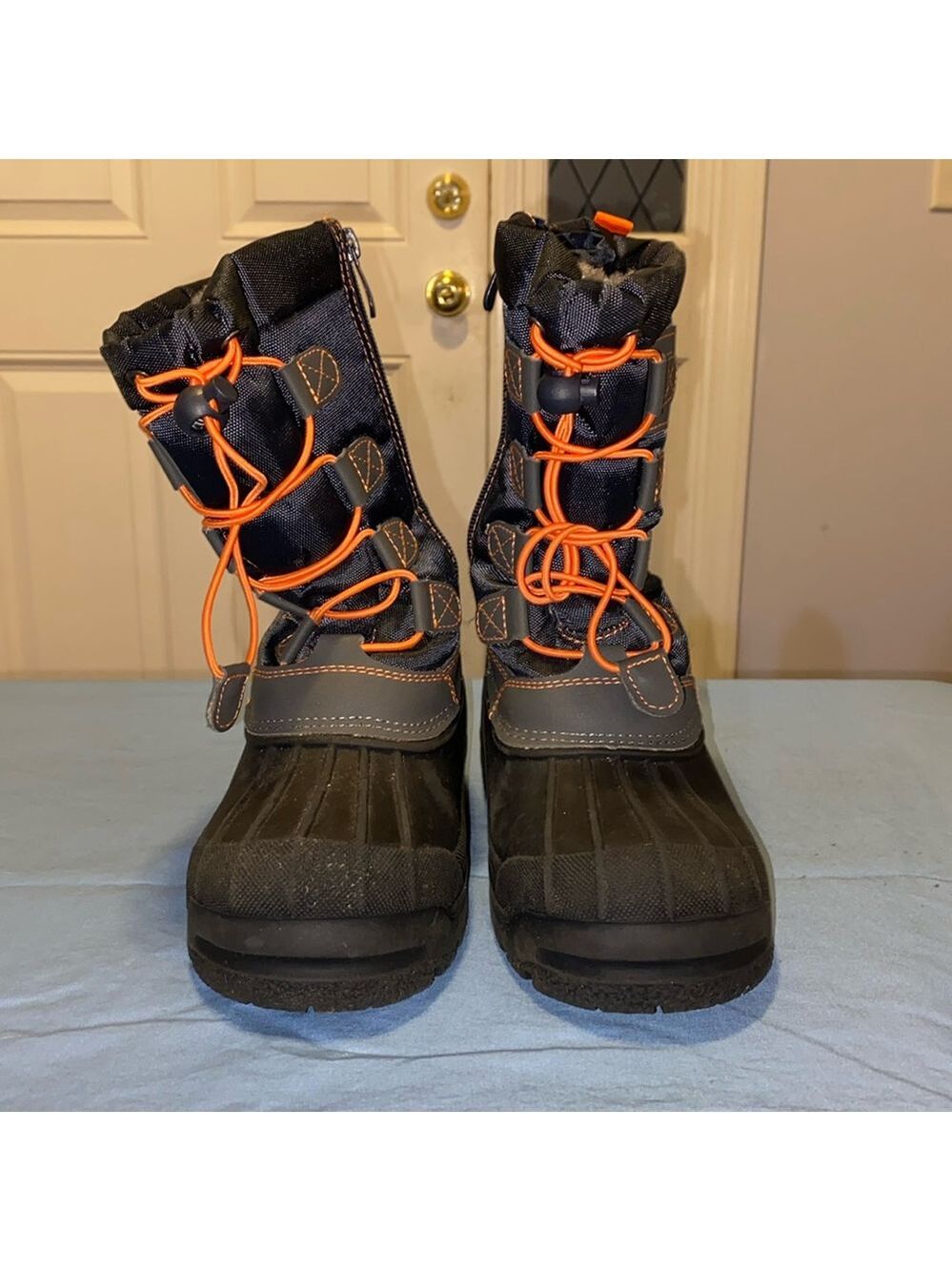 Kid’s size 1 Waterproof Dream Pairs boots
